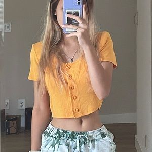 yellow crop buttoned top